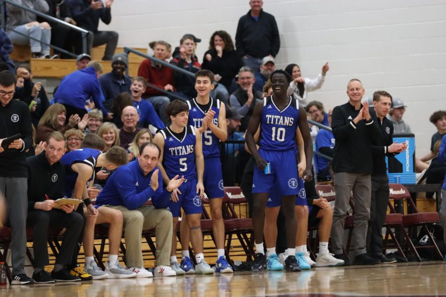 The Titans celebrate after a score. They went on to win 65-36  against cross town rivals Papillion LaVista.