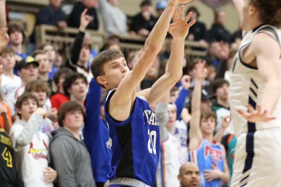 Bahl attempts a three in the District championship against Elkhorn South.