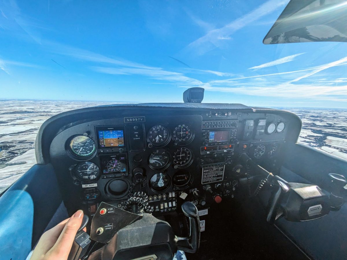 This photo share’s Rylie’s point of view from the pilot’s seat of a Cessna 172. A pilot must pay attention to their instrument panel as well as their surroundings. 