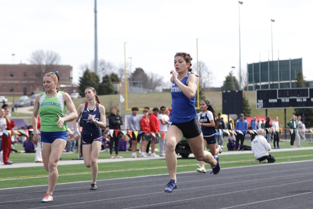 Aurora Griffin, 12th, finishing the 100m.