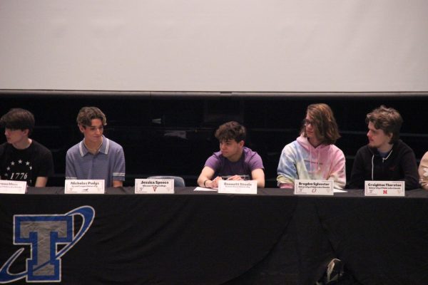 Bennett Steele awaits his turn to sign.