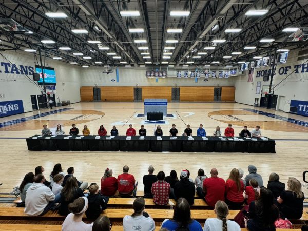 Student athletes gathered around for signing day.