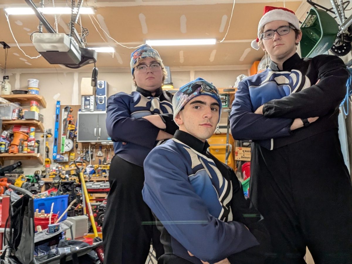 Colton Tuel, Dade Richart and Evan Redemske put their game faces on for a festive but frigid strut down Shadow Lake.