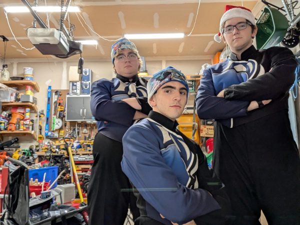 Colton Tuel, Dade Richart and Evan Redemske put their game faces on for a festive but frigid strut down Shadow Lake.