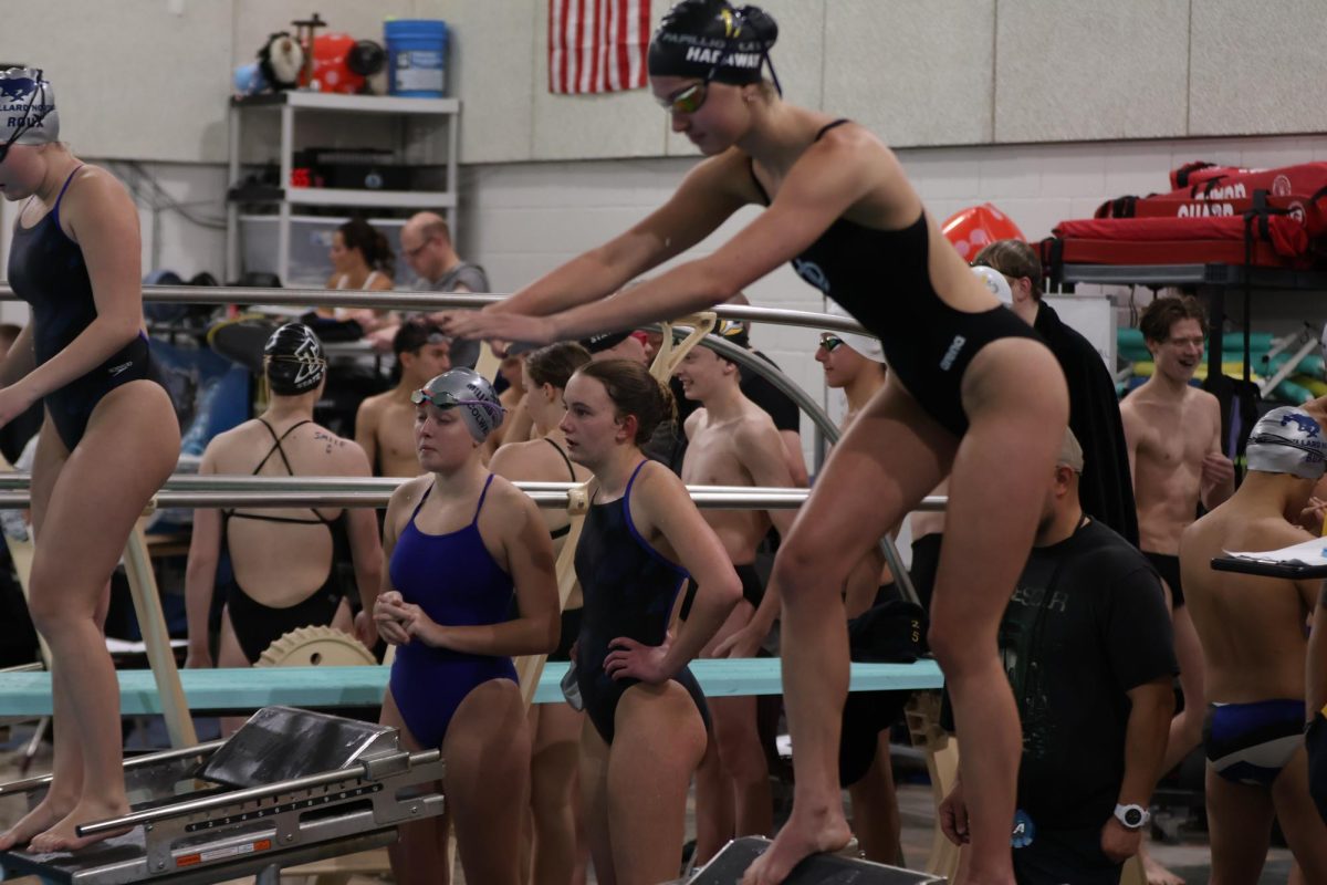 Senior Liv Hadaway at a swim meet.