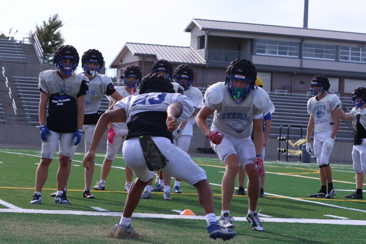 Senior Cole Lempp in a drill against Junior DB Bristol Gibson