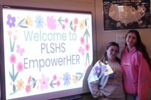 Seniors Paisley Bernth and Maddie Larsen lead at the new EmpowerHER club on their first meeting.