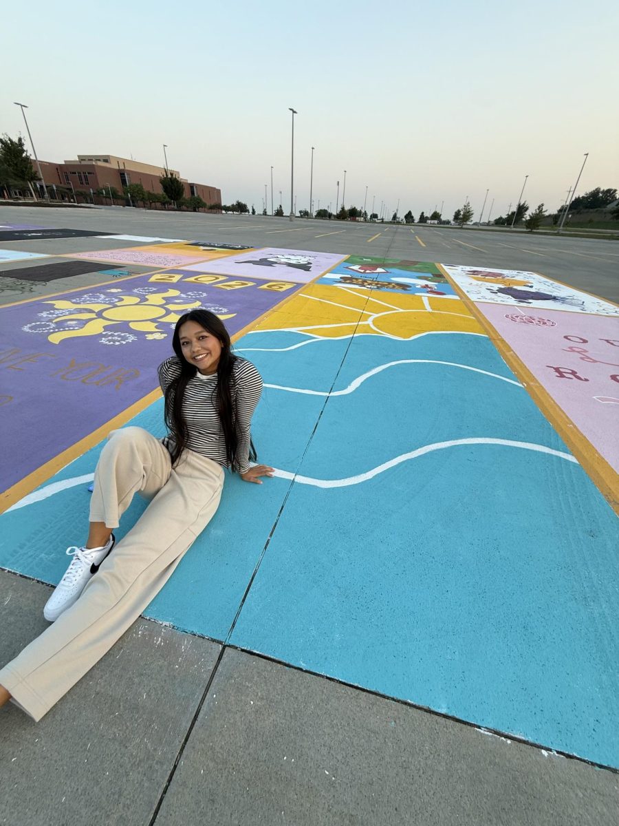 "I originally wanted to paint the Guam flag, but I quickly realized that flags weren’t allowed. Since I love the islands, I decided instead to paint the ocean with a sunset in the background!"