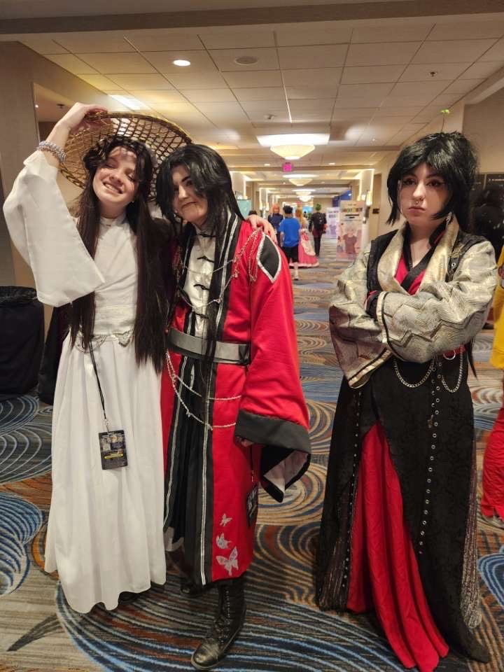 Amber Tomasek poses with friends at a cosplay convention.