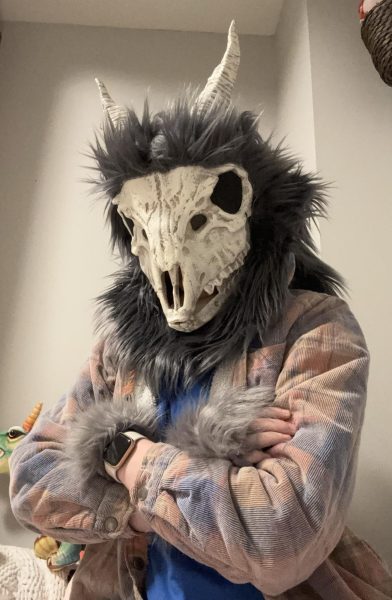Margot Dietrich poses with a mask she created for last years Halloween, a character she named “Reaper.”