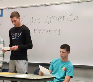 Club President Paul Connot and Vice President Jackson Tapper, both 11th, outline club values for prospective members at the first meeting of Club America on Nov. 5.