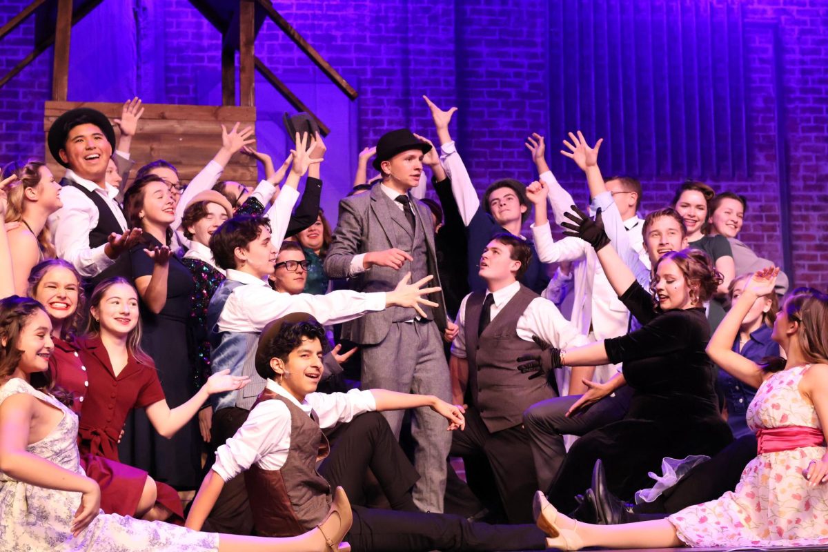 Police Lieutenant Frank Cioffi, played by Eli Olson, 12th, takes the spotlight when trying to solve a murder case, but incidentally saves a musical production.