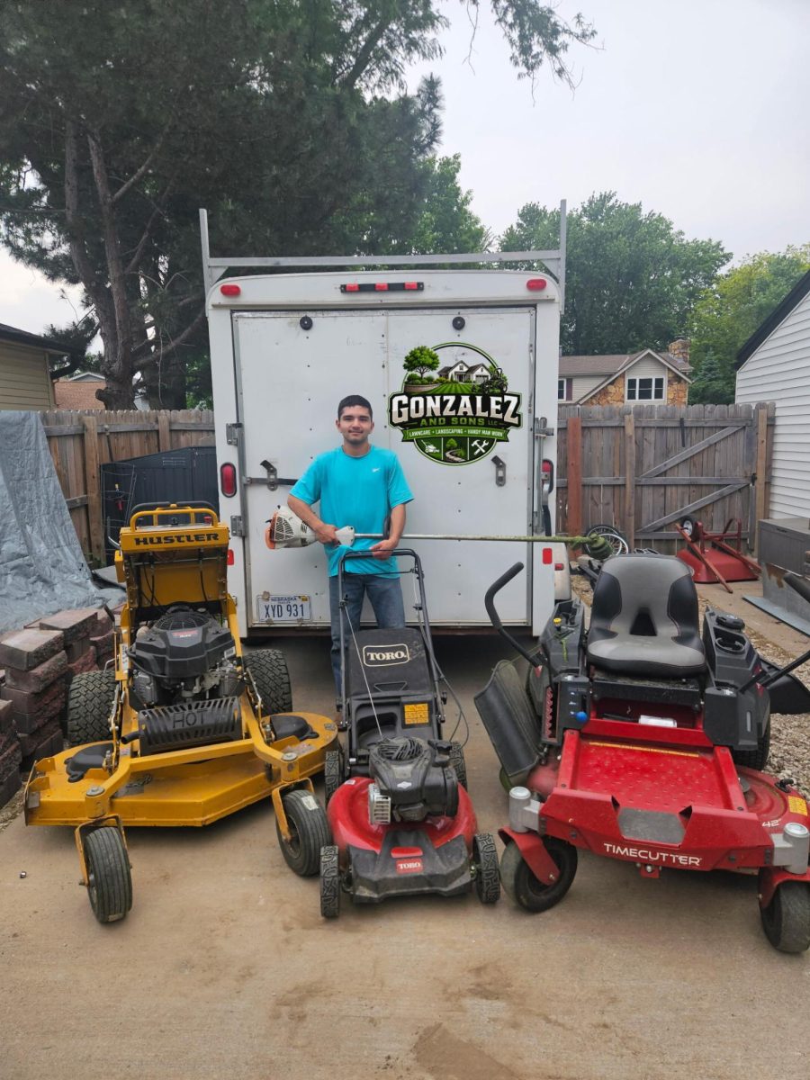 Sophomore Armando Gonzalez displays the equipment he's accumulated for his growing lawn care business. (courtesy photo)